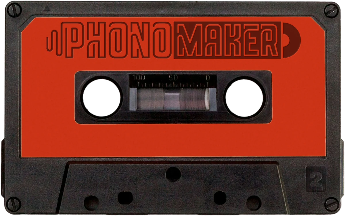Cassette Phonomaker, coque noire et étiquette orange à logo gravé