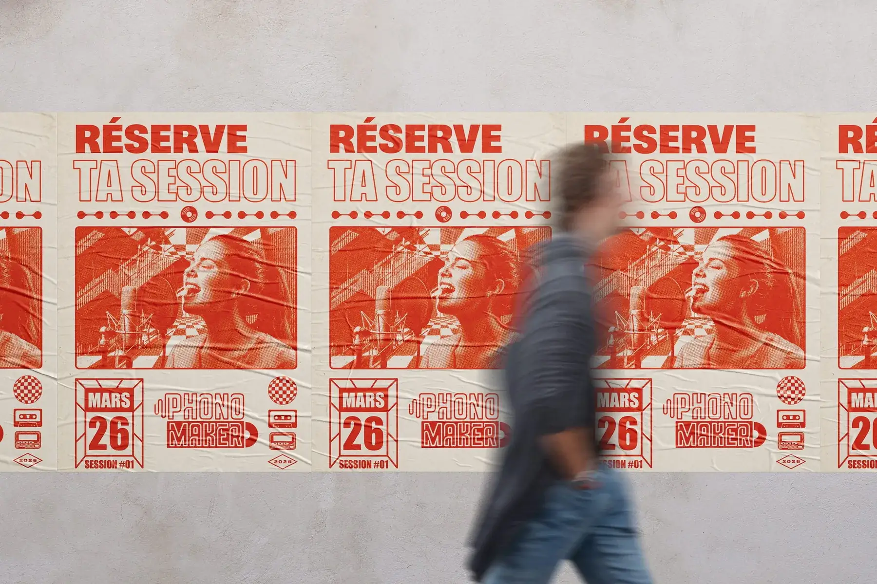 Affichage sauvage de posters Phonomaker sur un mur en ville